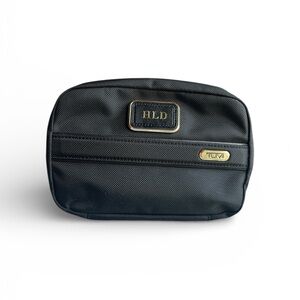 TUMI Black Toiletry Bag with Gold Accents